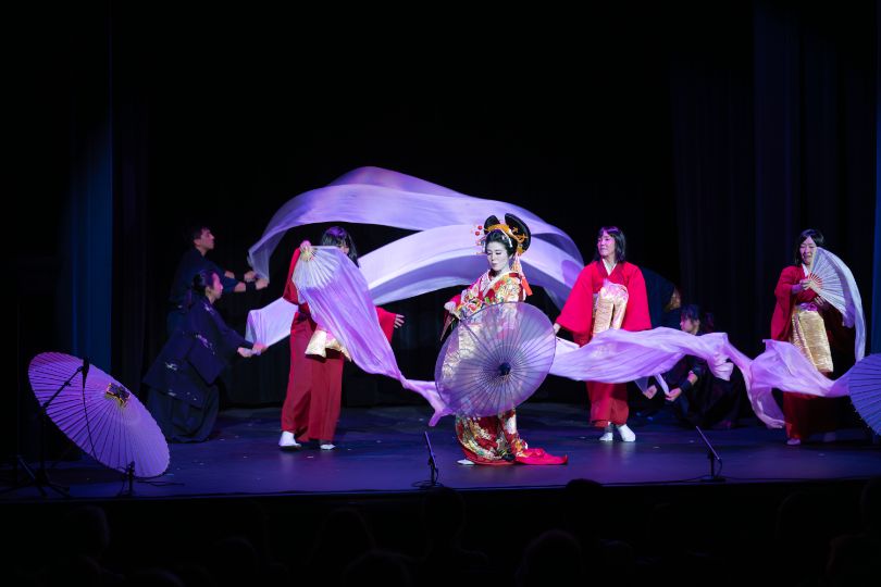 People dancing in theater