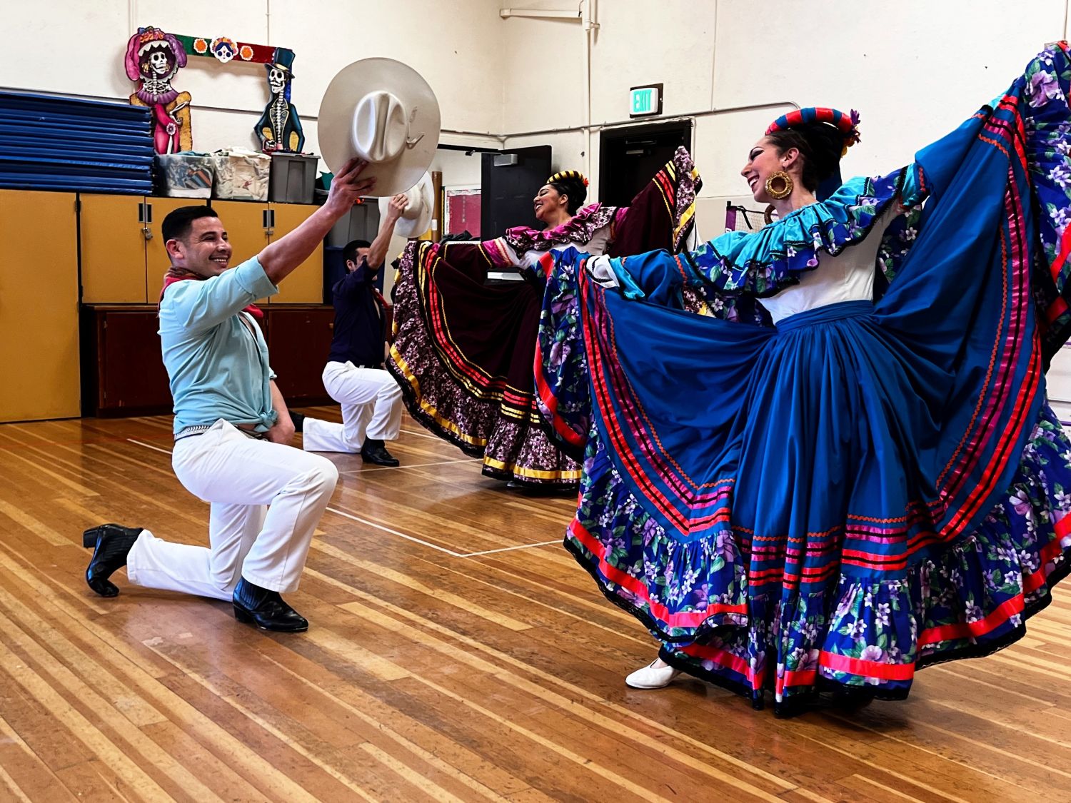 dancing people in colorful clothes