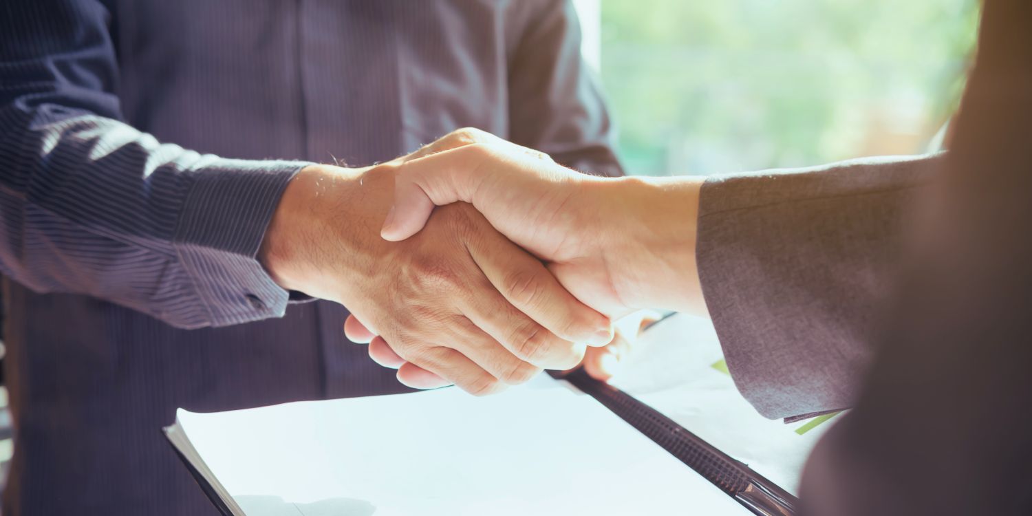 Two people shaking hands
