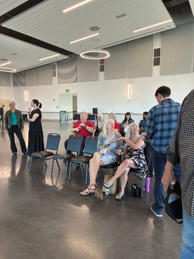 An eager audience waits for Mentor Artist Larry Meeks to present