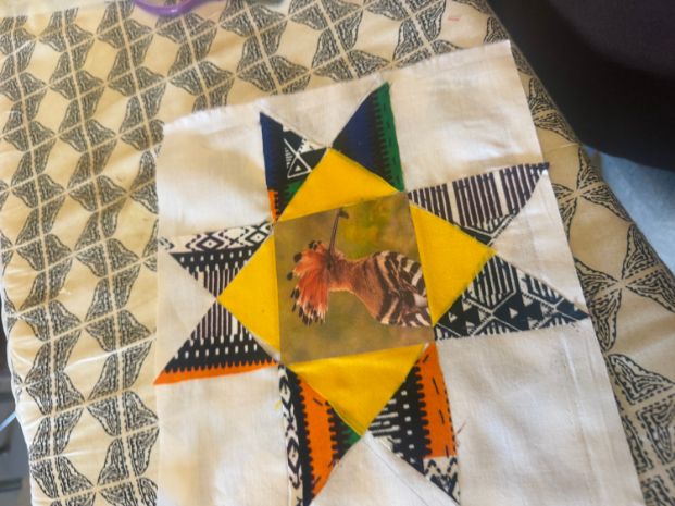 Shonna McDaniels creates an Ohio Quilt with students from Ms. Kiburi's Class.