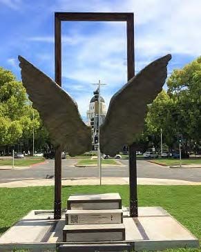 Image of wings framing the CA State Capitol Building