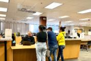 Photo of customers visiting the public counter reception desk