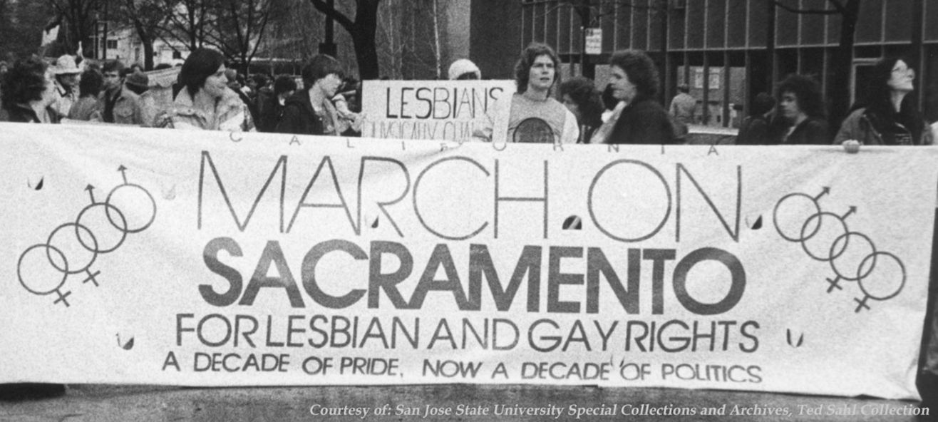 Lesbian and gay rights march historic black and white photo of people holding a sign for the march/walk.