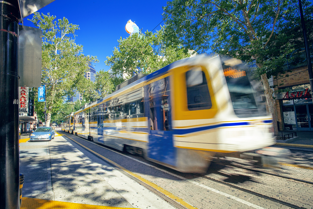 Image of a light rail car in motion. 