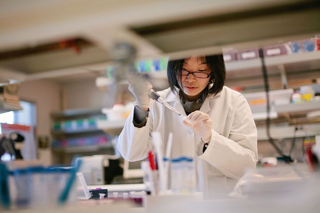 Image of person in a lab. 