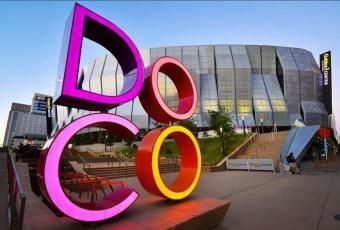 DOCO Sign with Golden 1 Center in the background.