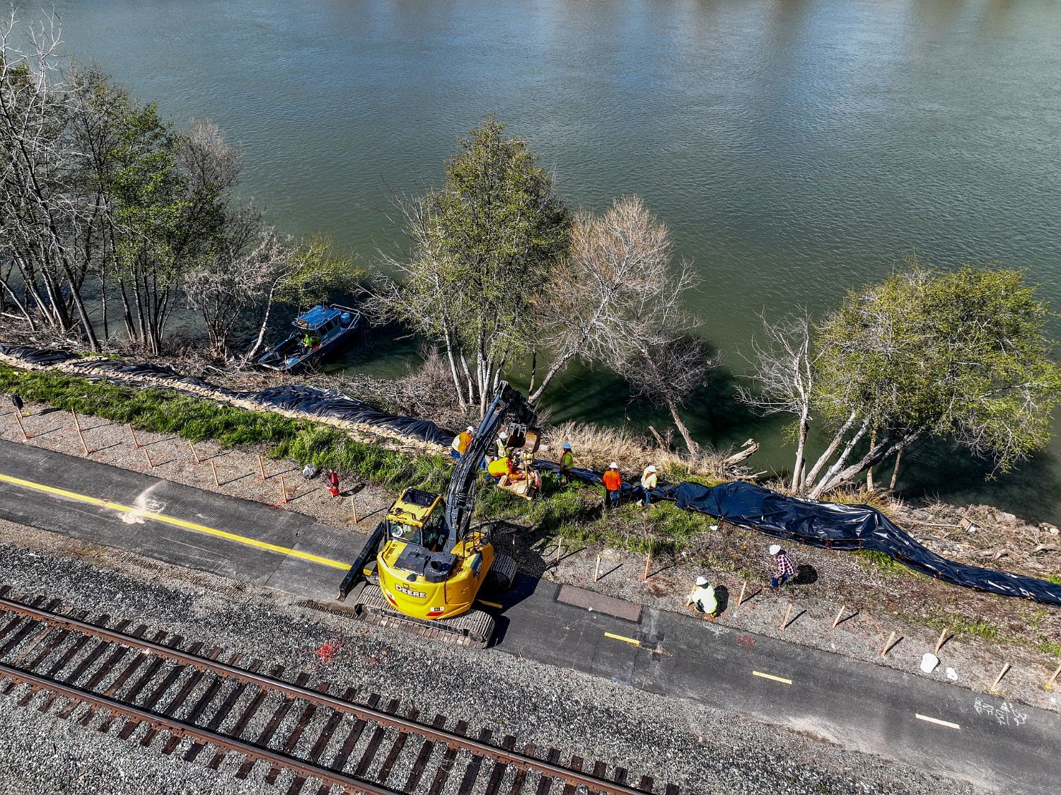 Construction crews on a levee