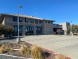 Station 43 building with 3 glass doors and glass windows 