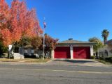 Station 60 Street view of front of the building double red garage door 