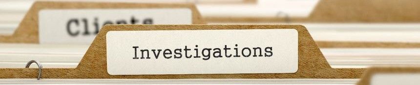 Manila folder labeled "Investigations" filed with other folders