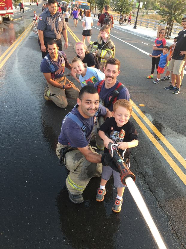 Reserves in turnouts posing on the side of an engine