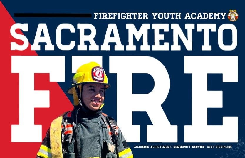 Cadet standing with hose on his shoulder, bold white letters behind saying Sacramento Fire