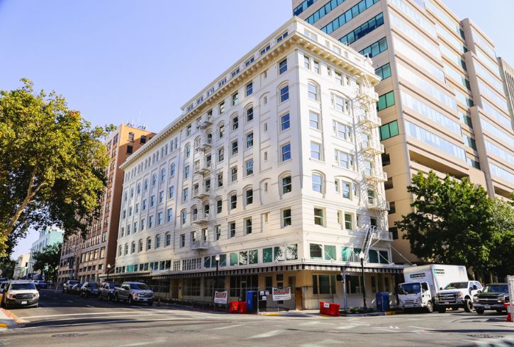 Historical Capitol Park Hotel, trees, cards, street
