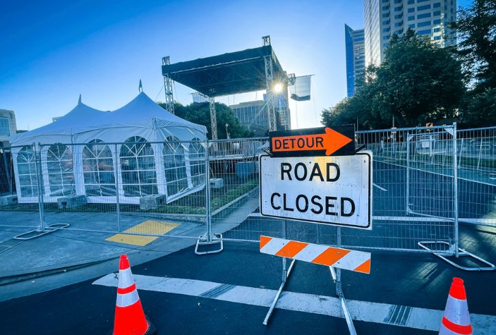 Road closure, detour sign, traffic cones