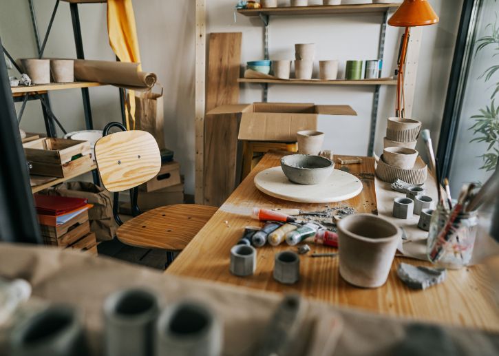 Studio table, ceramics, tools, clay