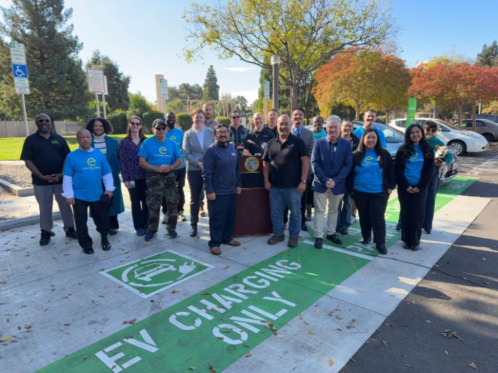 Group photo at EV charging station