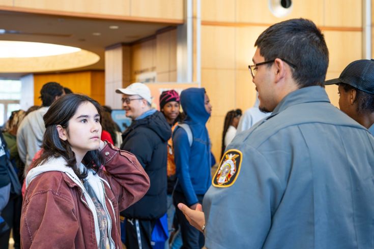 Youth Resource & Employment fair at City Hall. Youth speaking to City staff