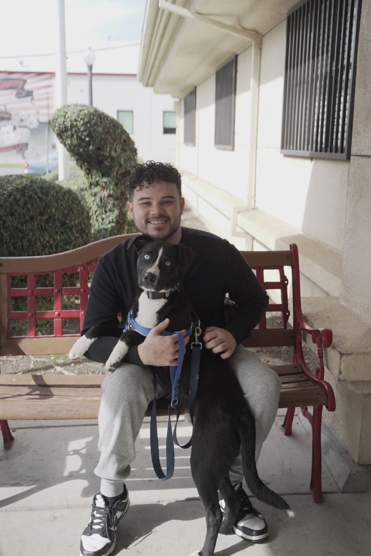 Person and dog smiling for camera