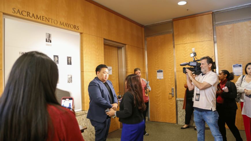 New D2 City councilmember, Shoun Thao being interviewed by media