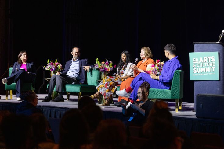 Panel discussion at CA Arts & Culture Summit. 5 people sitting and talking on stage.