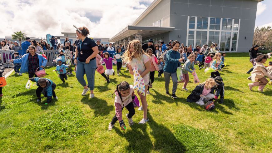 Egg hunt, kids, staff members, park, grass
