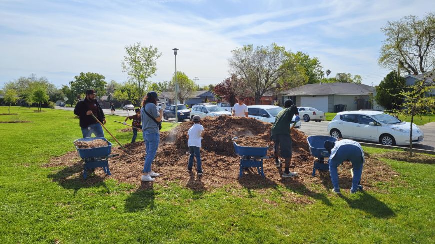 Volunteers working n a park for Earth day