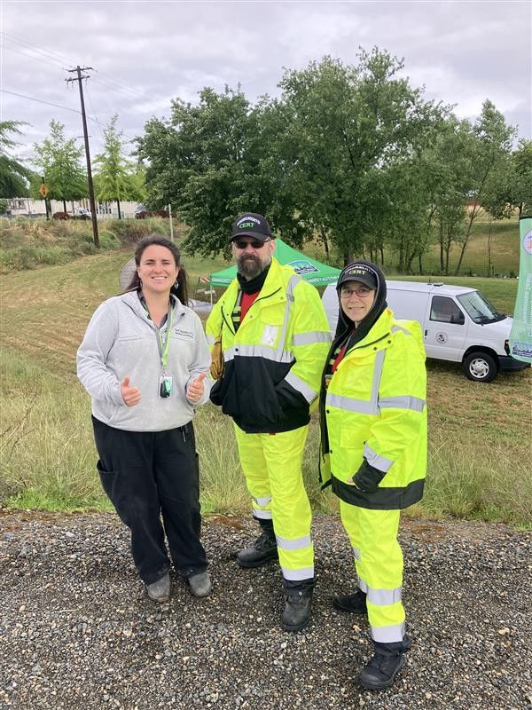 DCR staff workers taking group photo in park