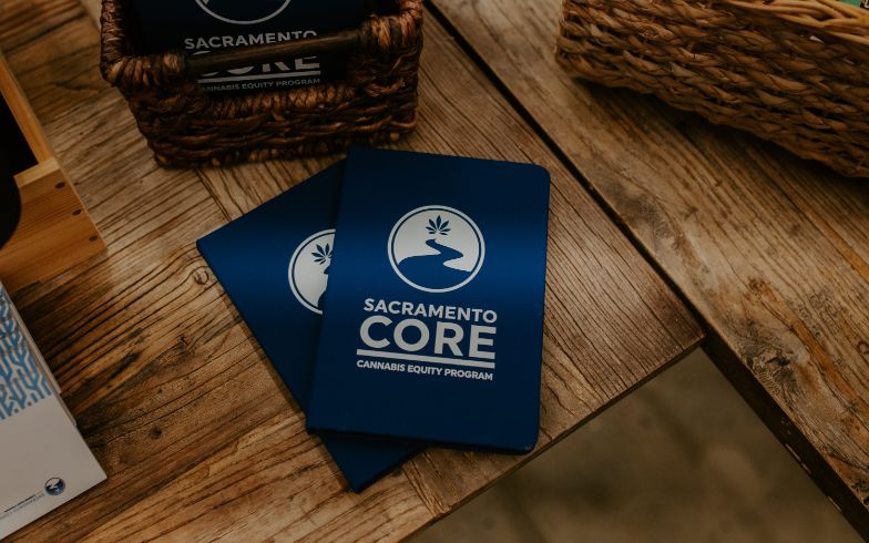 Booklet on table, text: Sacramento CORE