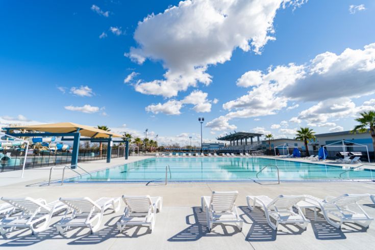 Sacramento pool, lounge chairs, clouds