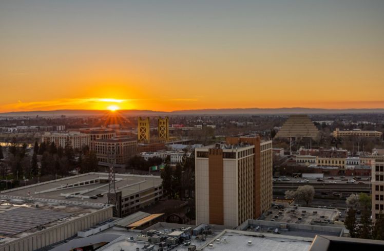 Downtown Sacramento, sunburst at the horizon