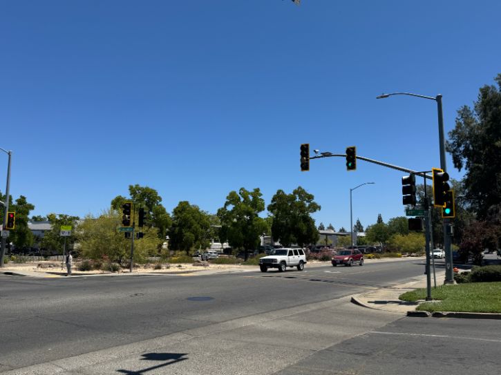 49th Street and Broadway, cars, streetlight, trees
