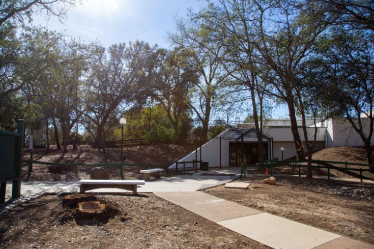 Outreach and Engagement Center in Sacramento, walking path, trees, bench
