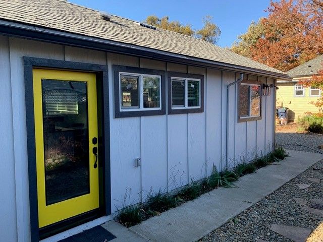 ADU, blue with yellow doors