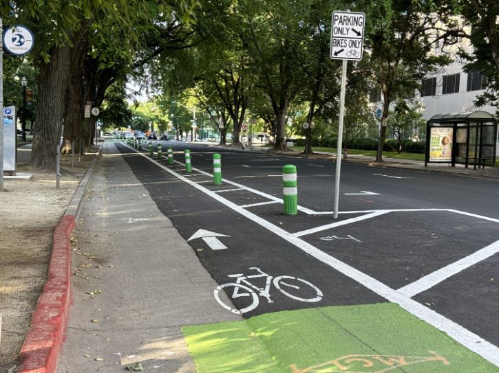 Bike lane, street, trees, bus stop