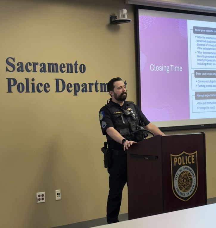 Officer speaking at podium 