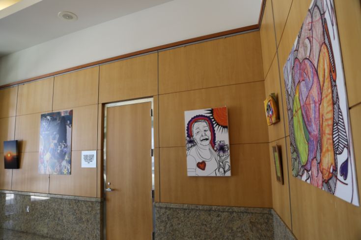 Painting hanging on wall of exhibit