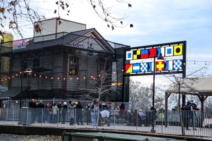 Old steamers building, crowd of people
