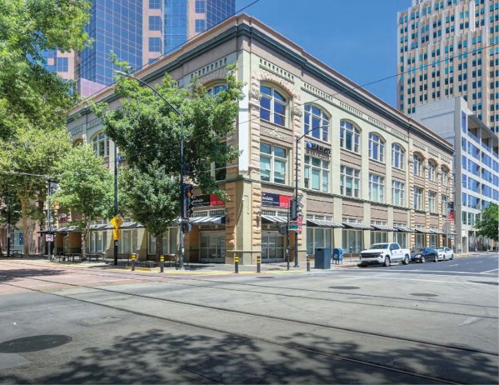 Hale building in Downtown Sacramento, trees, street, cars, city buildings