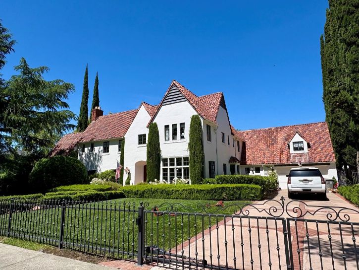 historic home in Sacramento. white house, trees, fence, driveway, lawn