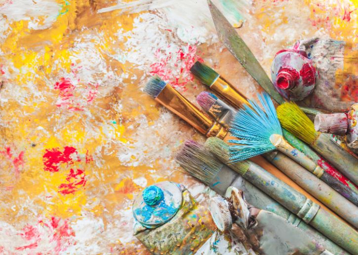 Paintbrushes, paint splatters