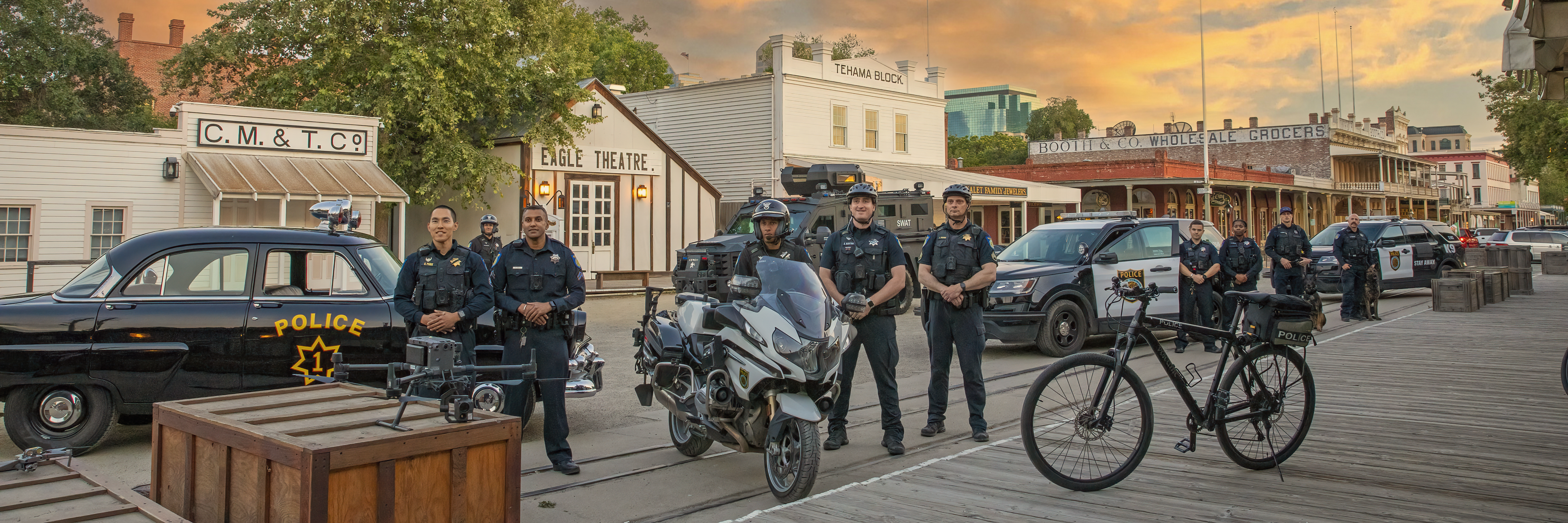 Photograph of police equipment and police officers outside in Old Sacramento