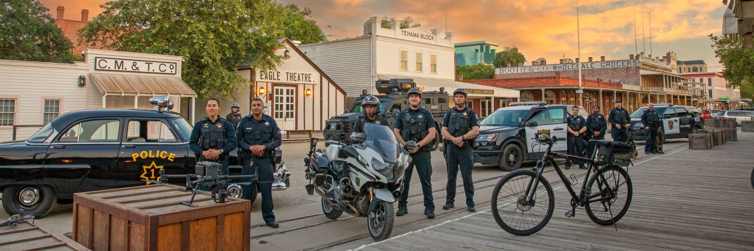 Photograph of police equipment and police officers outside in Old Sacramento