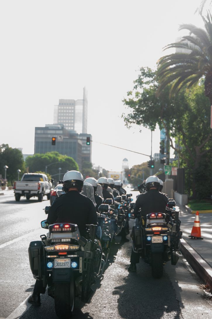 two rows of motor officers parked on the street in downtown Sacramento