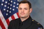 A portrait photo of the Sacramento Police Department Lieutenant Greg Galliano, in full class-A uniform