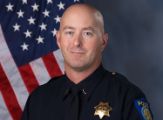 A portrait photo of the Sacramento Police Department Lieutenant Robert Young, in full class-A uniform
