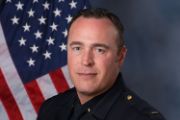 A portrait photo of the Sacramento Police Department Lieutenant Brent Meyer, in full class-A uniform