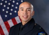 A portrait photo of the Sacramento Police Department Lieutenant Orlando Morales, in full class-A uniform