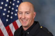 A portrait photo of the Sacramento Police Department Lieutenant Robert Young, in full class-A uniform