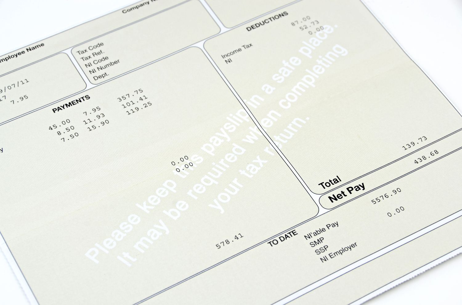 Image of a paycheck stub printed on white paper